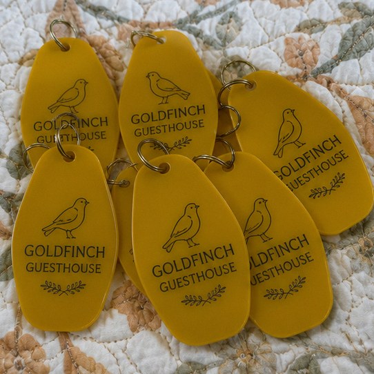 Motel keychains with logo — customer photo